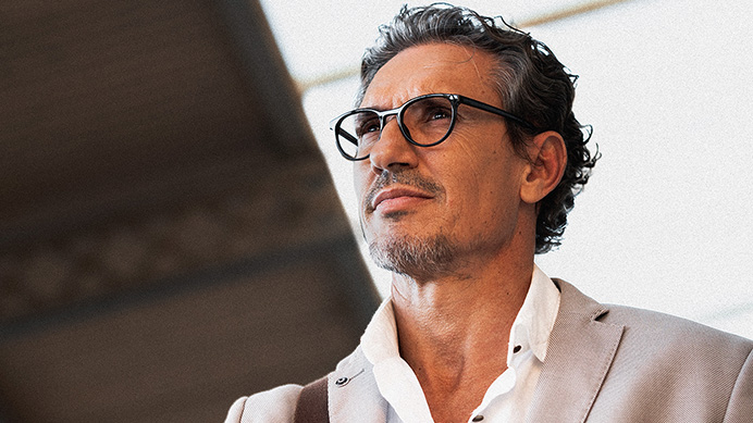 A person looking into the distance as they think through something