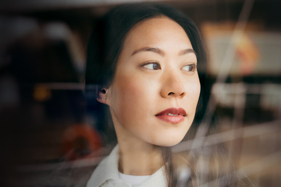 Person looking out a window