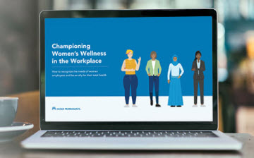 Laptop showing text which reads Championing women's wellness in the workplace